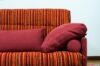 Armrest with cushion and rubber roller