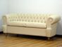 Chester custom sofa with gold leaf feet