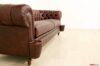 Chesterfield sofa armrests with cups