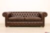 Chesterfield sofa in dark brown leather with brass-plated nails