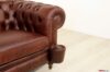 Armrest with leather-covered nails