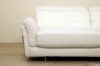 Armrest with white leather seat