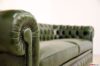 Hand-wrought aged brass nails of Chesterfield sofa