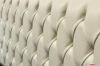 Capitonné work important headboard with silver leaf frame