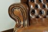 Brown vintage leather armrest detail