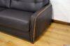 Walnut-colored leather and wood armrest