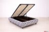 French-style cpontenitore bed with blue blue green plaid fabric shades
