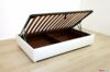 White faux leather storage bed