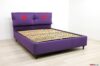 Custom bed with embroidered headboard