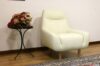 Leather armchair with wooden feet