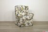 Armchair with ears in floral fabric