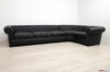 Large rounded chesterfield corner sofa in black leather