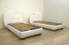 Heart-shaped single white leather beds