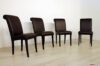 Upholstered chairs with high wooden feet