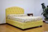 Bed with buttoned base