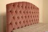 Pink cotton velvet capitonné headboard bed.
