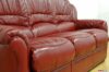 High-backed leather sofa in red color
