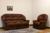 Brown leather sofa and armchair on offer