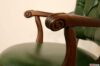 Carved wooden chair armrests