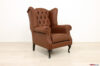 Brown leather bergere armchair with capitonné workmanship