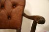 Carved wooden armrest