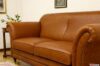 Sofa without cushions in the backrest