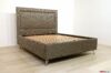 Designer bed with high steel feet