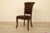 Elegant upholstered wooden chair with capitonné backrest