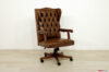 Brown leather and wood office armchair
