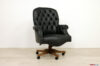 Classic capitonné office armchair in black leather