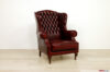 Antique red leather capitonné bergere armchair
