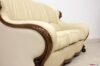 Luxury leather and carved wood sofa armrest