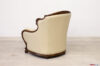 Back view of luxury leather armchair with wooden frame