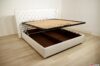 white faux leather storage bed