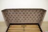Japanese low bed with modern capitonné headboard