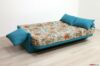 Open folding sofa bed in floral fabric