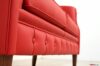 Buttoned leather sofa base with high feet