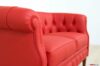 Classic red leather sofa armrest
