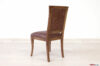 Behind wood and leather office chair