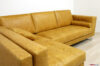 Quilted seats of modern yellow leather sofa